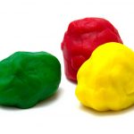 Photo of three balls of modelling clay