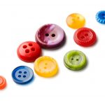 Photo of differently sized and colour buttons
