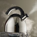 Photo of boiling kettle on stovetop