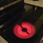 Photo of stovetop with red element indicating heat