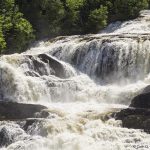 Photo of water running over rocks
