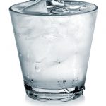 Photo of glass with water and ice cubes