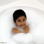 Photo of child in bubble bath