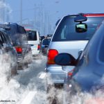 Photo of road traffic with pollution from cars