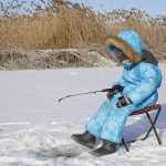 Photo of child ice fishing
