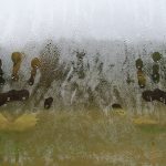 Photo of condensation on window with handprints