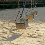 Photo of rusty swings