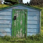 Photo of weathered door on shed