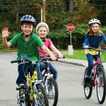 Photo of family cycling