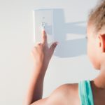 Photo of child turning off switch